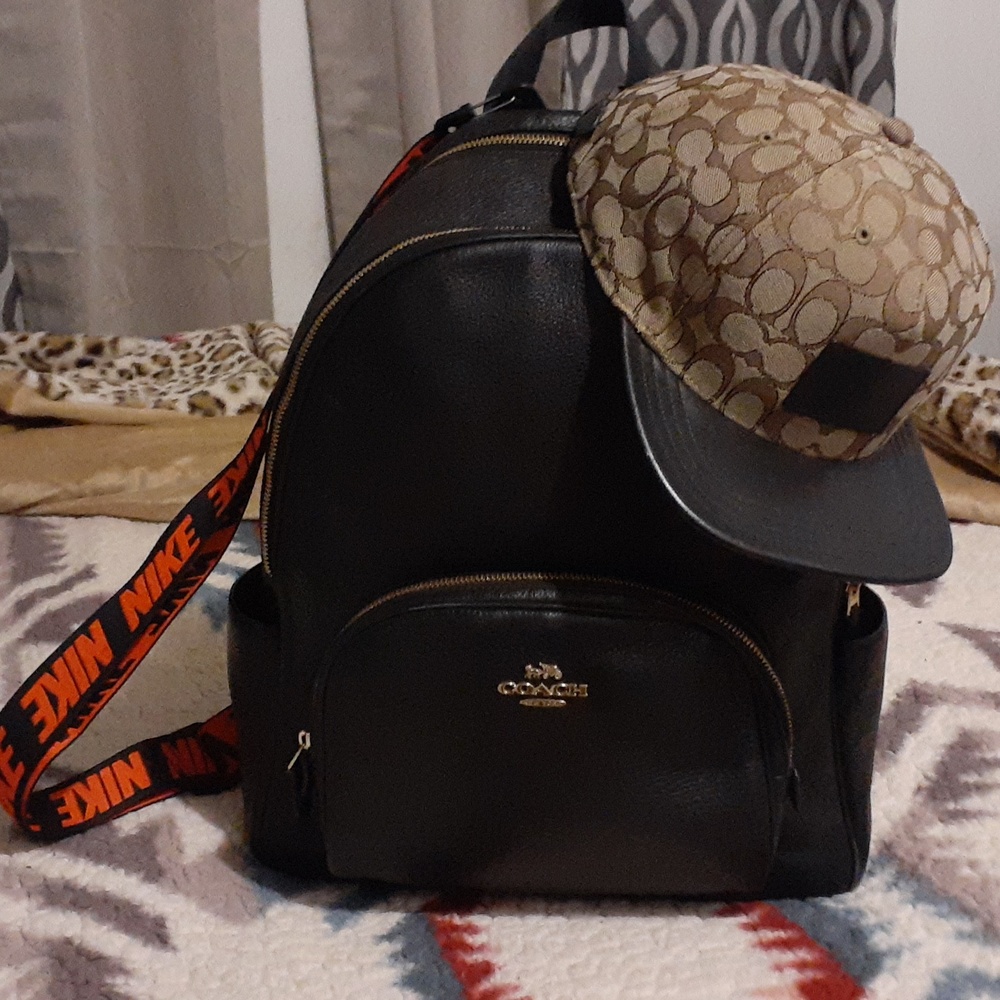 Coach back pack with matching coach hat with a nike strap